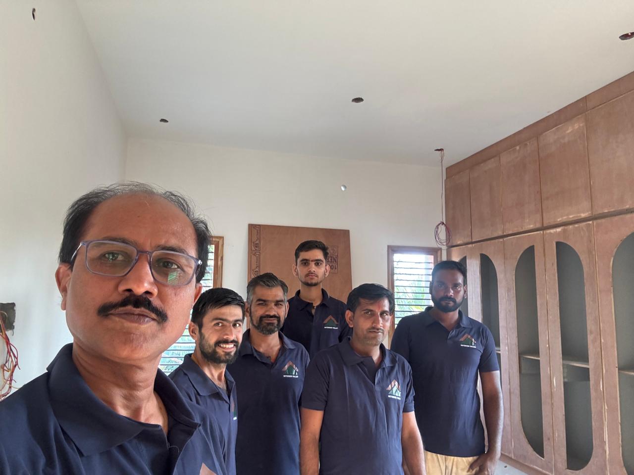 The Interior Valley team on site, in a room being fitted out behind them