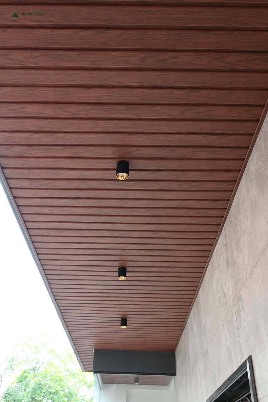 Wood slat ceiling detail with recessed spotlights