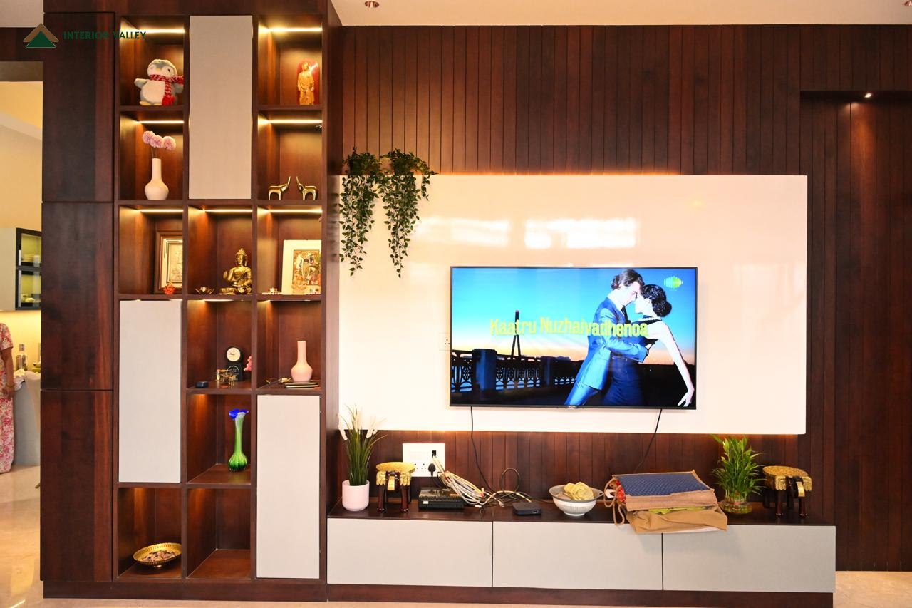Television unit in wood with backlit open display shelving