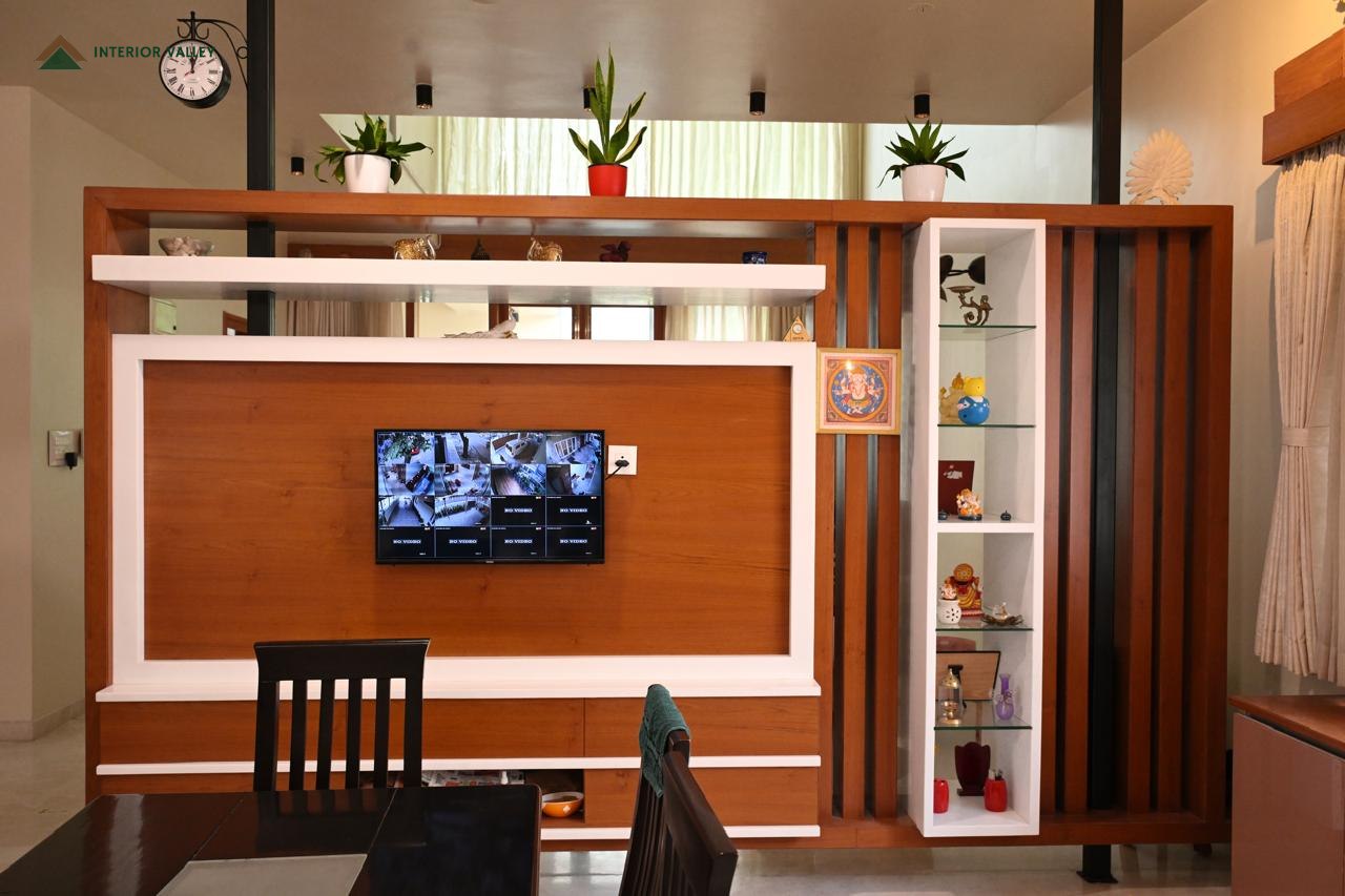 Television unit with open shelving and a slatted room partition