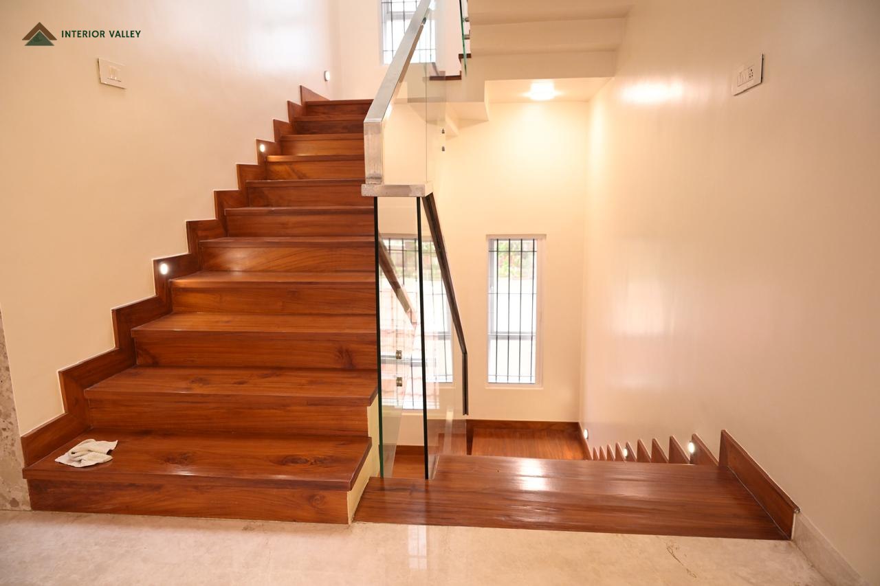 Timber staircase with a glass railing